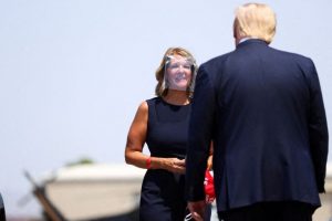 Reuters FILE PHOTO: Former Arizona Republican Party Chairman Kelli Ward greets U.S. President Donald Trump as he arrives at Yuma International Airport in Yuma, Arizona, U.S., August 18, 2020.