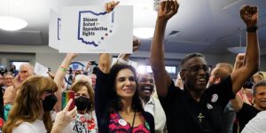 People celebrate the defeat of Issue 1 during a watch party in Columbus, Ohio on Wednesday. Jay LaPrete / AP