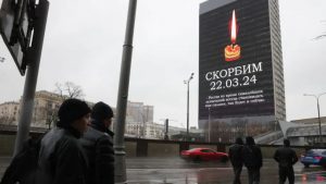 Screens all around Moscow are showing images of a burning candle along with the Russian word "Skorbim" ("We mourn")