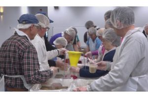 Butler County Lions Club members pack more than 10,000 meals to fight hunger