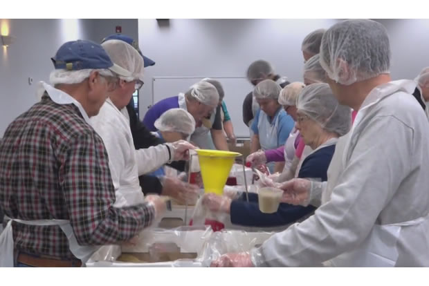 Butler County Lions Club members pack more than 10,000 meals to fight hunger